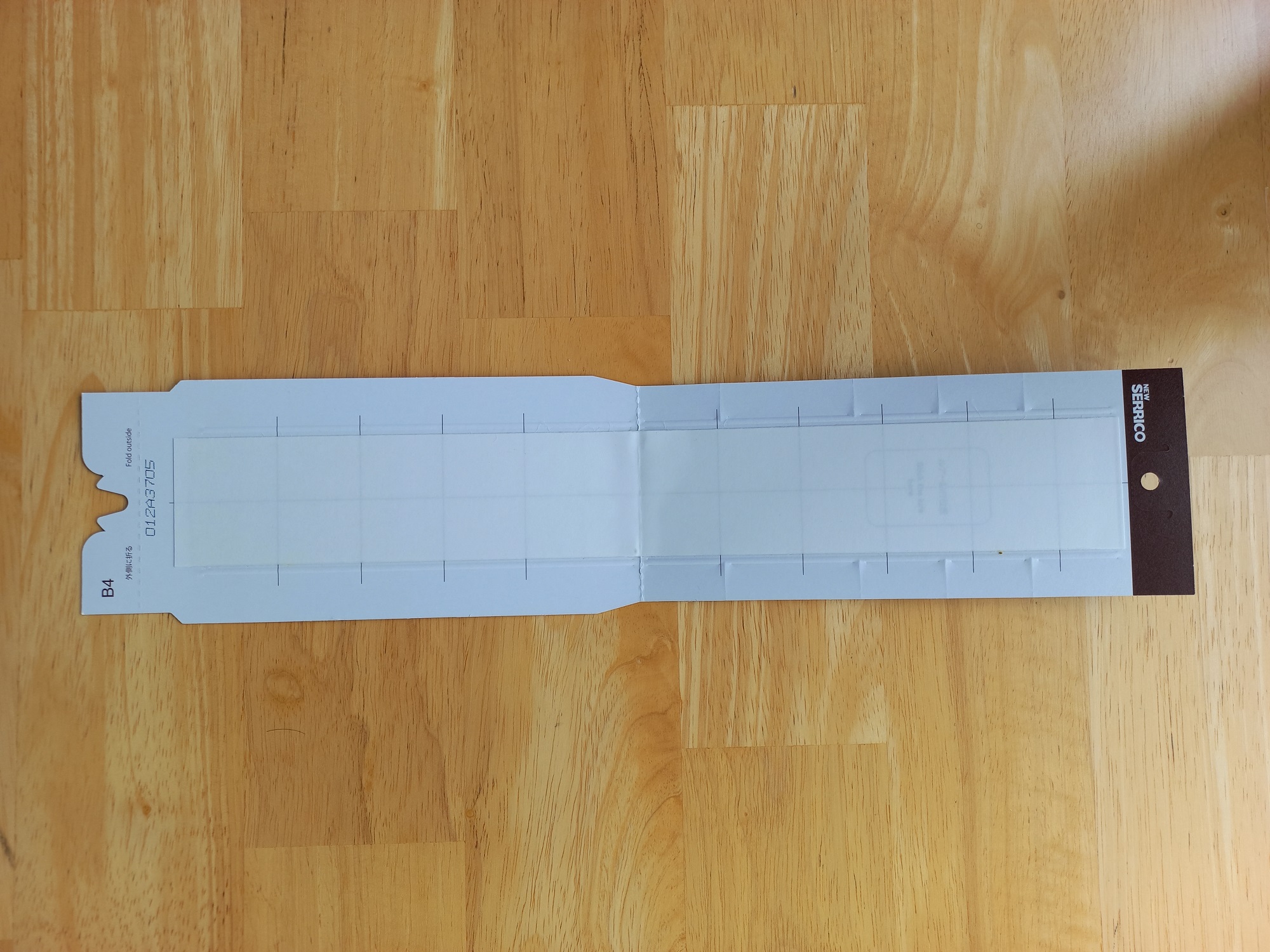 Opened_New_Serrico_Trap_Showing_Sticky_Surface_With_Release_Paper